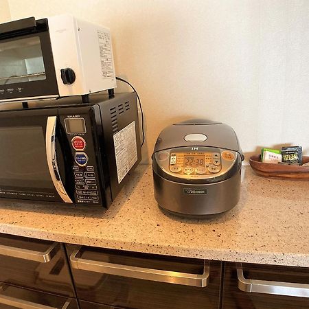 Ferienwohnung 真栄田グランブルー403 ~ Maeda Grand Blue 403 ~ Onna Exterior foto